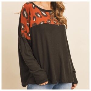 Riah Fashion black animal print soft boutique top S